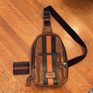 Coach Cross-Over Leather Bag. Single adjustable strap with matching wallet.